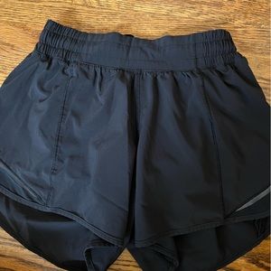 LIGHTLY WORN BLACK LULULEMON SHORTS 4”